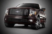 fordf150harley_front The exterior of the 2010 Ford Harley-Davidson F-150 offers a bold front fascia and a six-bar shaped billet style grille and boasts specialized forged aluminum and Harley-Davidson chrome badging. The truck will have a lowered appearance because of a fully integrated deployable running board. (Image: Ford)