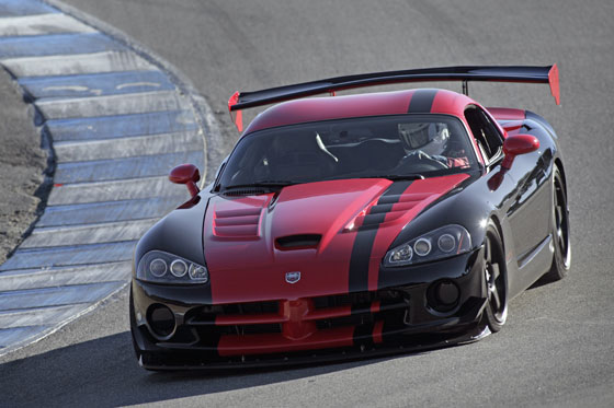 A street-legal 2010 Dodge Viper SRT10 ACR driven by Chris Winkler, SRT vehicle dynamics engineer, set a new lap record of 1:33.915 at the Laguna Seca raceway in Monterey, Calif., shattering the previous lap record by more than 1.1 seconds. (Image: Chrysler group)