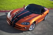 2010 Dodge Viper SRT10 Roadster in Toxic Orange Pearl Coat with 2010 Dodge Viper SRT10 Roadster in Toxic Orange Pearl Coat with black dual racing stripes. (Image: Dodge)
