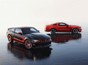 12MustangBoss302_11 2012 Mustang Boss 302 Laguna Seca: The race-ready 2012 Mustang Boss 302 Laguna Seca (foreground) and the street-legal Mustang Boss 302 (background). (Image: Ford)